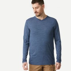 Koszulka trekkingowa z długim rękawem męska Forclaz Travel 500 Merino. Niebieskie koszulki męskie z długim rękawem FORCLAZ, l, z materiału. Za 129.99 zł.