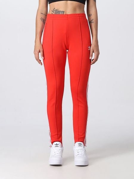 Adidas Spodnie dresowe w kolorze czerwonym rozmiar: 38. Czerwone spodnie dresowe damskie Adidas, s, bez wzorów, z dresówki. Za 126.75 zł.