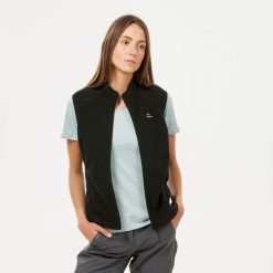 Kamizelka turystyczna polarowa damska Quechua MH100. Czarne kamizelki damskie QUECHUA, m, z materiału. Za 59.99 zł.