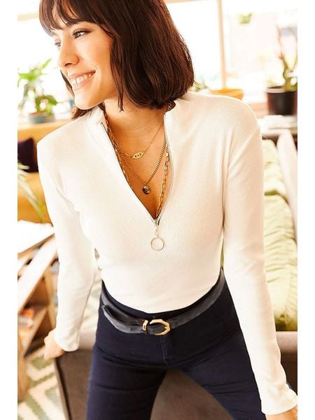 Olalook Koszulka w kolorze kremowym rozmiar: L. Brązowe bluzki damskie Olalook, l, bez wzorów, bez kołnierzyka, bez ramiączek. Za 56.99 zł.