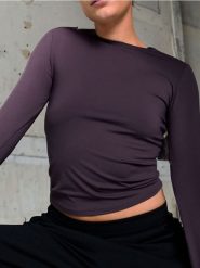 Koszulka z długimi rękawami - fioletowy. Fioletowe t-shirty damskie Sinsay, l, bez wzorów, bez kołnierzyka. Za 19.99 zł.