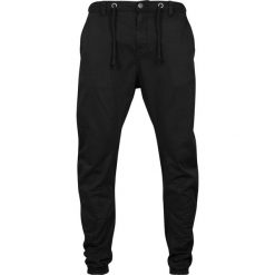 Spodnie Urban Classics elastyczne. Czarne spodnie materiałowe męskie Urban Classics, bez wzorów, z bawełny. Za 206.95 zł.