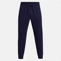 Spodnie dresowe męskie UNDER ARMOUR Rival Fleece joggery. Niebieskie spodnie dresowe męskie Under Armour, bez wzorów, z dresówki. Za 169.99 zł.
