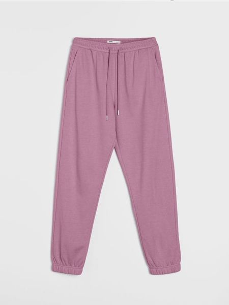 Dresowe spodnie jogger terry - różowy. Czerwone spodnie sportowe damskie Sinsay, l, z dresówki. Za 29.99 zł.
