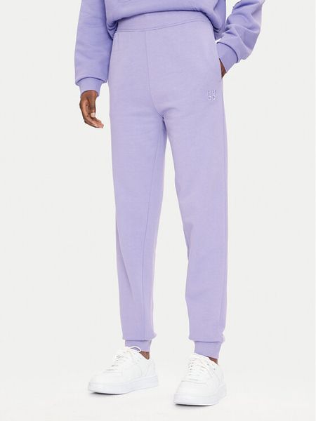 Hugo Spodnie dresowe Nelfinia 50522417 Fioletowy Regular Fit. Fioletowe spodnie dresowe damskie Hugo, s, bez wzorów, z bawełny. Za 599.99 zł.