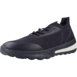 Tenisówki Geox Model U Spherica Actif A Kolor Niebieski. Niebieskie trampki i tenisówki męskie Geox, bez wzorów, z syntetyku, bez zapięcia. W wyprzedaży za 377.50 zł.