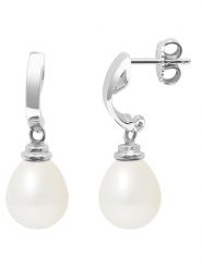 Pearline Srebrne kolczyki-wkrętki z perłami rozmiar: onesize. Białe kolczyki damskie Pearline, z perłą, srebrne. Za 239.99 zł.