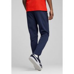 Męskie spodnie Portugalia Casuals PUMA Persian Blue Sunny Yellow. Niebieskie spodnie dresowe męskie Puma, bez wzorów, z dresówki. Za 269.00 zł.
