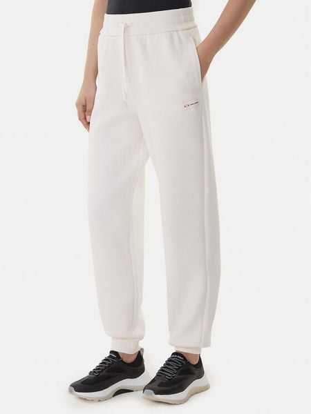 Armani Exchange Spodnie dresowe XW001287 AF16134 U1003 Écru Regular Fit. Spodnie dresowe damskie Armani Exchange, xs, bez wzorów, z bawełny. Za 509.99 zł.