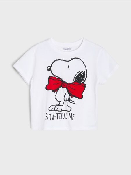 Bawełniana koszulka z nadrukiem Snoopy - biały. Białe koszulki dziewczęce Sinsay, l, bez wzorów, z bawełny, bez ramiączek. Za 15.99 zł.