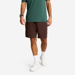 Spodenki fitness cardio męskie Domyos. Brązowe szorty męskie DOMYOS, m, z materiału, do biegania. Za 79.99 zł.