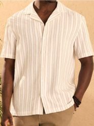 Luźna koszula w paski - kremowy. Białe koszule męskie Sinsay, l, bez wzorów, bez kołnierzyka, bez ramiączek. Za 59.99 zł.