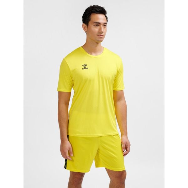 Niezbędna koszulka Hummel. Żółte bluzki damskie HUMMEL, bez wzorów, sportowe, bez kołnierzyka, bez ramiączek. Za 120.00 zł.