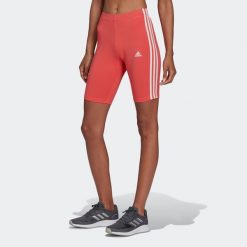 Spodenki fitness damskie Adidas. Czerwone spodenki sportowe damskie Adidas, bez wzorów, z bawełny, sportowe. W wyprzedaży za 79.99 zł.
