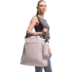 Torba damskie Puma At Ess Tote Bag 26.5L. Fioletowe torebki klasyczne damskie Puma, bez wzorów, z materiału, bez dodatków. Za 290.00 zł.