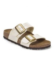Birkenstock Klapki "Sydney" w kolorze złotym rozmiar: 39. Żółte klapki damskie Birkenstock, bez wzorów, bez obcasa. Za 428.07 zł.
