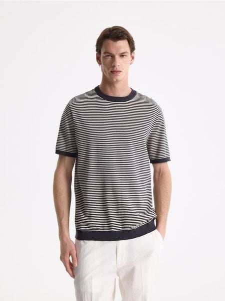 Bawełniany sweter z krótkim rękawem - czarny. Czarne swetry męskie Reserved, l, bez wzorów, z bawełny, bez kołnierzyka. Za 99.99 zł.