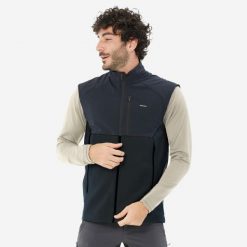 Kamizelka turystyczna męska polarowa Quechua MH500. Czarne kamizelki męskie QUECHUA, l, z elastanu. Za 139.99 zł.