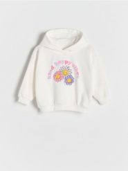 Bluza z aplikacją SmileyWorld® - złamana biel. Bluzy i bluzki niemowlęce Reserved, z aplikacjami, z bawełny, bez ramiączek, z kapturem. W wyprzedaży za 39.99 zł.