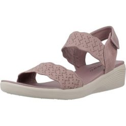 Sandały SKECHERS ARYA Fioletowy. Fioletowe sandały damskie Skechers, bez wzorów, z tkaniny, bez obcasa. Za 215.99 zł.