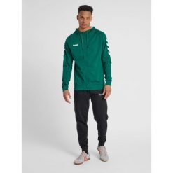 Bluza z kapturem sportowa męska Hummel Go Cotton Zip Hoodie. Zielone bluzy sportowe męskie HUMMEL, bez wzorów, sportowe, bez kołnierzyka, bez ramiączek. Za 98.00 zł.