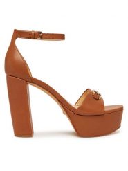 Guess Sandały FLJSET LEA03 Brązowy. Brązowe sandały damskie Guess, z aplikacjami, ze skóry, bez obcasa, na słupku. Za 499.99 zł.