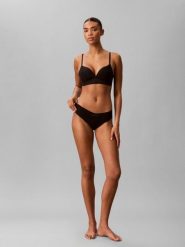 Calvin Klein Stringi Kobiety Sztuczne włókno czarny, L. Czarne stringi damskie CALVIN KLEIN, l, bez wzorów, z włókna. Za 119.95 zł.