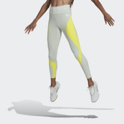 Legginsy Kobieta Adidas Hiit Colorblock zielony. Zielone legginsy damskie Adidas, l, bez wzorów. Za 234.05 zł.