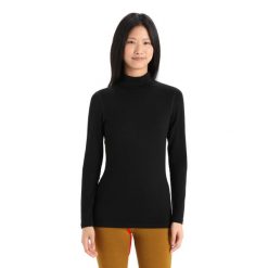 Koszulka z długim rękawem Damska Icebreaker 260 Tech LS Turtleneck. Czarne bluzki damskie Icebreaker, xl, bez wzorów, z wełny, bez kołnierzyka. Za 510.45 zł.