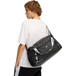 Torba Puma Phase Tape Small Sports Bag 22L. Czarne torebki klasyczne damskie Puma, bez wzorów, z materiału, bez dodatków. Za 290.00 zł.