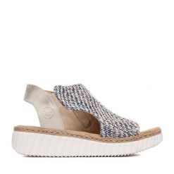 Sandały Rieker. Niebieskie sandały damskie Rieker, bez wzorów, bez obcasa, na koturnie. Za 329.99 zł.