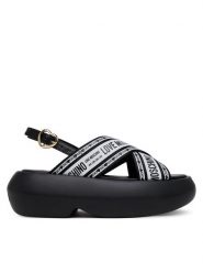 LOVE MOSCHINO Sandały JA16207I0MIX200A Czarny. Czarne sandały damskie Love Moschino, bez wzorów, z materiału, bez obcasa, na koturnie. Za 569.99 zł.