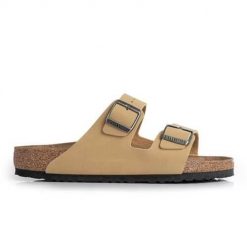 Klapki damskie Birkenstock Arizona. Żółte klapki damskie Birkenstock, bez wzorów, z materiału, bez obcasa. Za 425.35 zł.