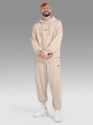 4F Spodnie dresowe joggery męskie 4F x Tomasz Fornal - beżowe L. Brązowe spodnie dresowe męskie 4f, z aplikacjami, z dresówki. Za 189.99 zł.