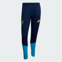 Spodnie treningowe Hiszpania 26 Tiro. Niebieskie spodnie sportowe męskie Adidas, z dresówki. Za 279.00 zł.