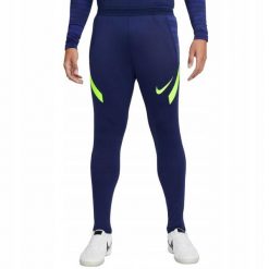 Męskie Spodnie Do Biegania Strike 21 DriFIT. Niebieskie spodnie materiałowe męskie Nike, bez wzorów, z materiału. Za 309.99 zł.