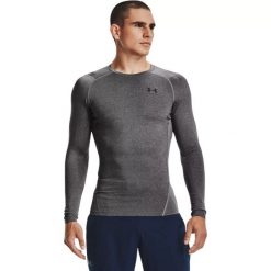 Koszulka męska treningowa szara Under Armour HeatGear Armour LongSleeve. Szare t-shirty sportowe męskie Under Armour, m, z elastanu, bez ramiączek, na fitness i siłownię. Za 109.99 zł.