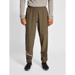Jogging Newline Portland. Brązowe spodnie dresowe męskie Newline, m, z dresówki, do biegania. Za 258.50 zł.
