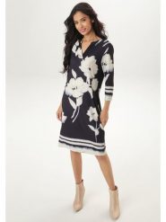 Aniston Sukienka w kolorze beżowym rozmiar: 38. Brązowe sukienki damskie Aniston, na co dzień, bez wzorów, bez kołnierzyka, bez ramiączek, midi, proste. Za 82.99 zł.