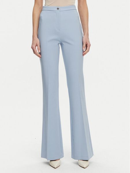 Artigli Spodnie materiałowe ACPA000840 Błękitny Regular Fit. Niebieskie spodnie materiałowe damskie Artigli, bez wzorów, z materiału. Za 209.99 zł.