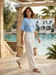 Bawełniana koszulka z haftowanym napisem Lagoon - błękitny. Niebieskie t-shirty damskie Sinsay, l, bez wzorów, z bawełny, bez kołnierzyka. Za 29.99 zł.