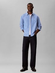 Calvin Klein Jeans koszula codzienna Mężczyźni Comfort Fit Bawełna (100%) niebieski, L. Niebieskie koszule męskie Calvin Klein Jeans, na lato, l, bez wzorów, z bawełny, bez kołnierzyka, bez ramiączek. Za 409.95 zł.
