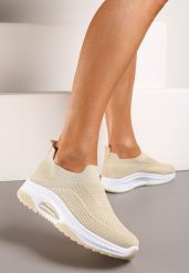 Beżowe Wsuwane Buty Sportowe na Koturnie z Perforacją Mellarina. Brązowe czółenka damskie Born2be, bez wzorów, bez obcasa, na koturnie. Za 44.99 zł.