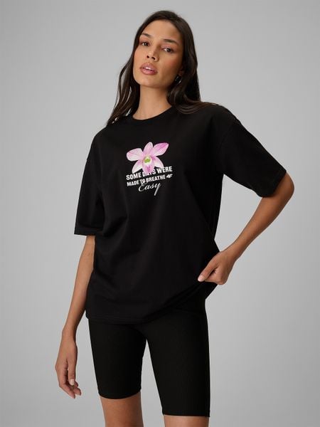 4F T-shirt loose z nadrukiem damski - czarny XS. Czarne t-shirty damskie 4f, xs, bez wzorów, z bawełny, bez kołnierzyka. Za 79.99 zł.
