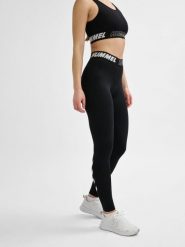 Damskie bawełniane legginsy o średnim kroju Hummel TE Maja. Czarne legginsy damskie HUMMEL, xs, bez wzorów, z bawełny. Za 161.50 zł.