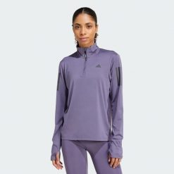 Kurtka Own the Run Half-Zip. Fioletowe kurtki damskie Adidas, xs, bez wzorów, z materiału, bez kaptura. Za 219.00 zł.