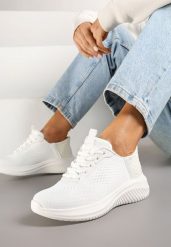 Białe Buty Sportowe Sneakersy z Siateczki na Podeszwie z Tłoczeniami Kortebia. Białe buty sportowe na co dzień damskie Renee, bez wzorów, z jeansu. Za 74.99 zł.