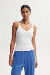 TOP CAMI BIAŁY M - Flawless. Białe topy damskie Flawless, m, bez wzorów, z bawełny, bez kołnierzyka. Za 179.00 zł.