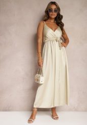 Beżowa Sukienka Wieczorowa o Rozkloszowanym Kroju z Gumką w Pasie i Rozcięciem Relsea. Brązowe sukienki damskie Renee, na imprezę, bez wzorów, eleganckie, bez kołnierzyka, bez ramiączek, maxi, rozkloszowane. W wyprzedaży za 59.49 zł.