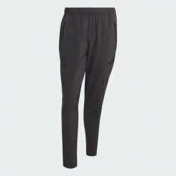 Spodnie Audi Revolut F1 Team Dna Vis Tech. Czarne spodnie materiałowe męskie Adidas, bez wzorów. Za 329.00 zł.